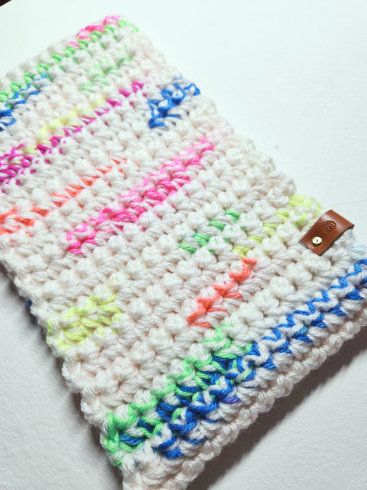Colorful hat with a brand label on a white background