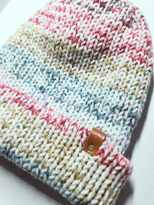 close up of autumn colored beanie