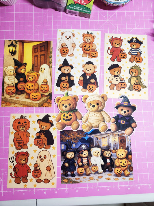 Halloween-themed bear stickers on a pink cutting mat