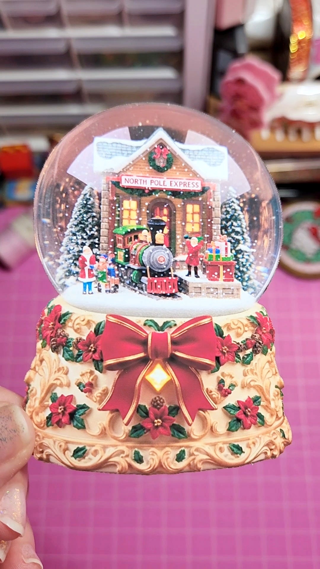 Decorative Christmas music box with a North Pole train station scene.
