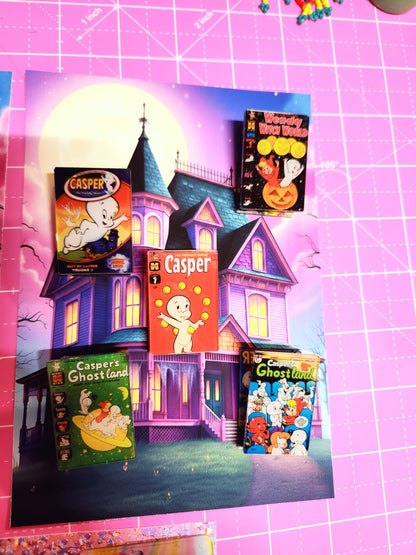 Collection of Halloween-themed candy boxes on a pink grid background