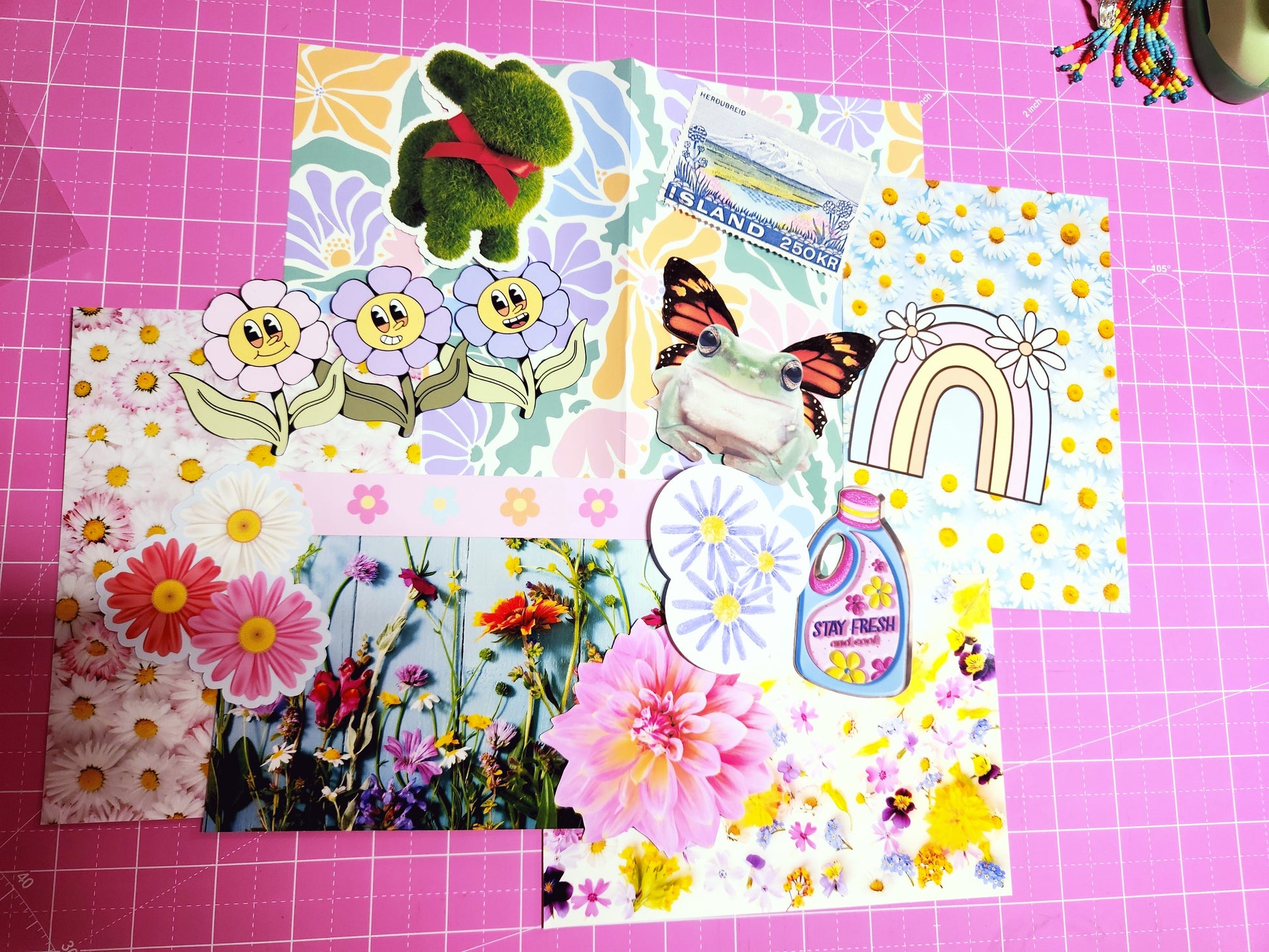Colorful children's stickers on a pink grid background