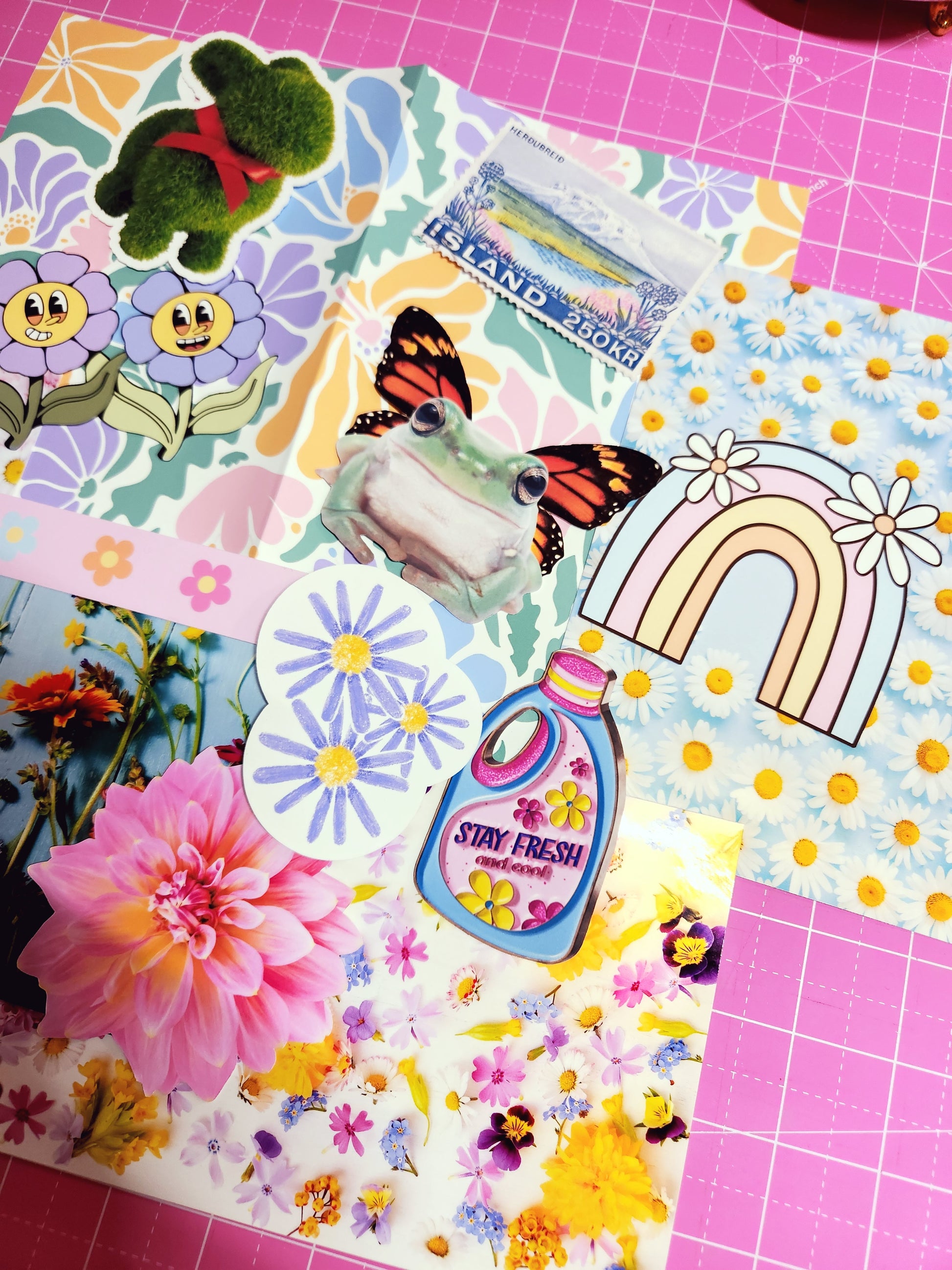 Collage of colorful stickers on a pink grid background