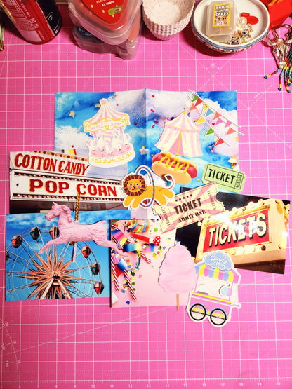 Colorful carnival-themed cutout decorations on a pink grid background