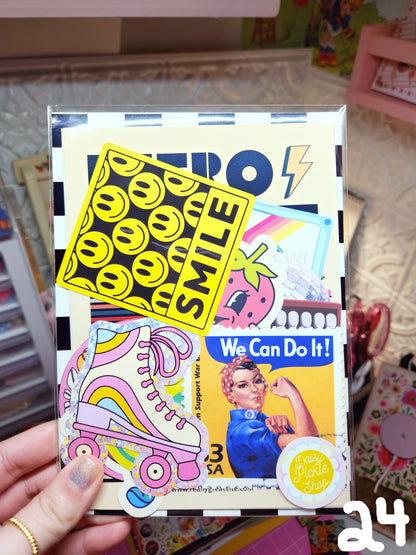 Colorful book with stickers and a hand holding it