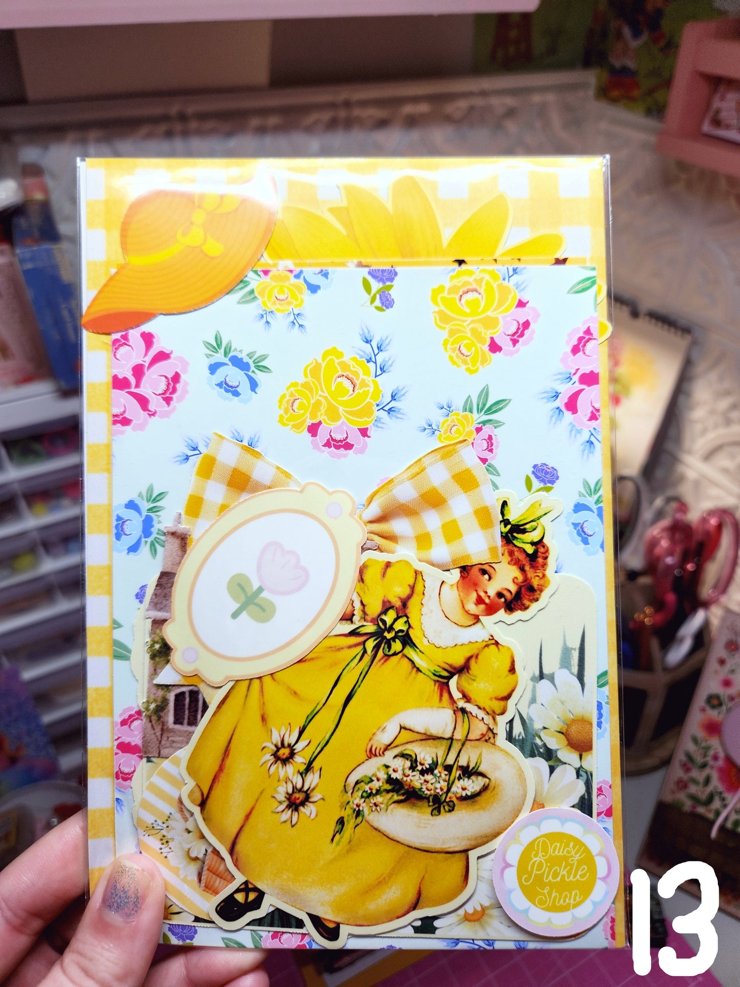 Decorative greeting card with vintage-style illustration of a woman and pumpkins.