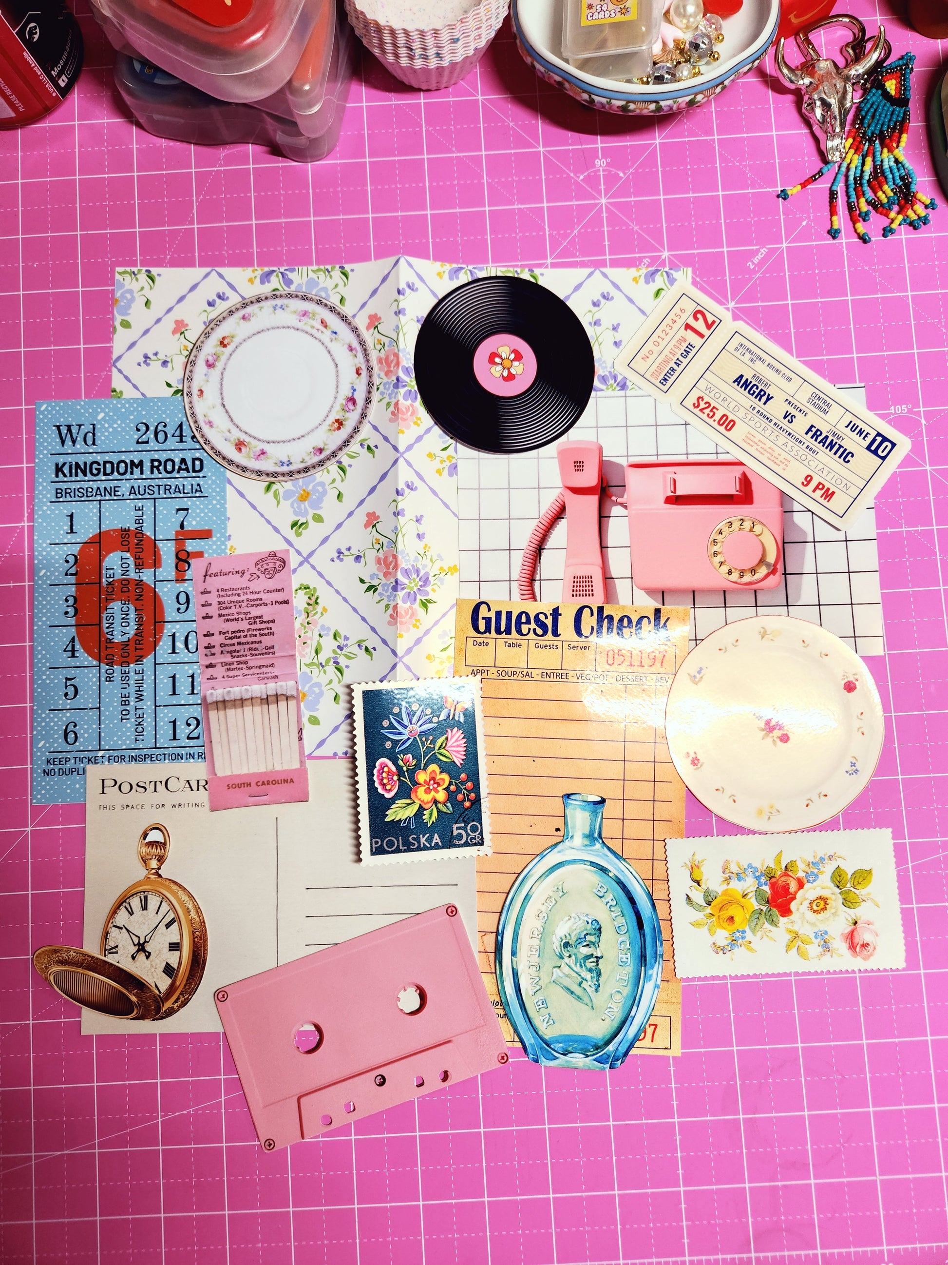 Collection of vintage items on a pink grid background
