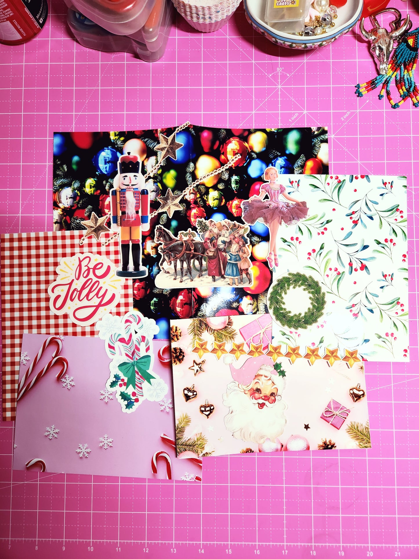 Collection of decorative cards and stickers on a pink grid background