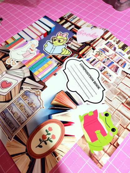 Collage of stationery items including a composition book, frog character, and decorative elements on a pink grid background.