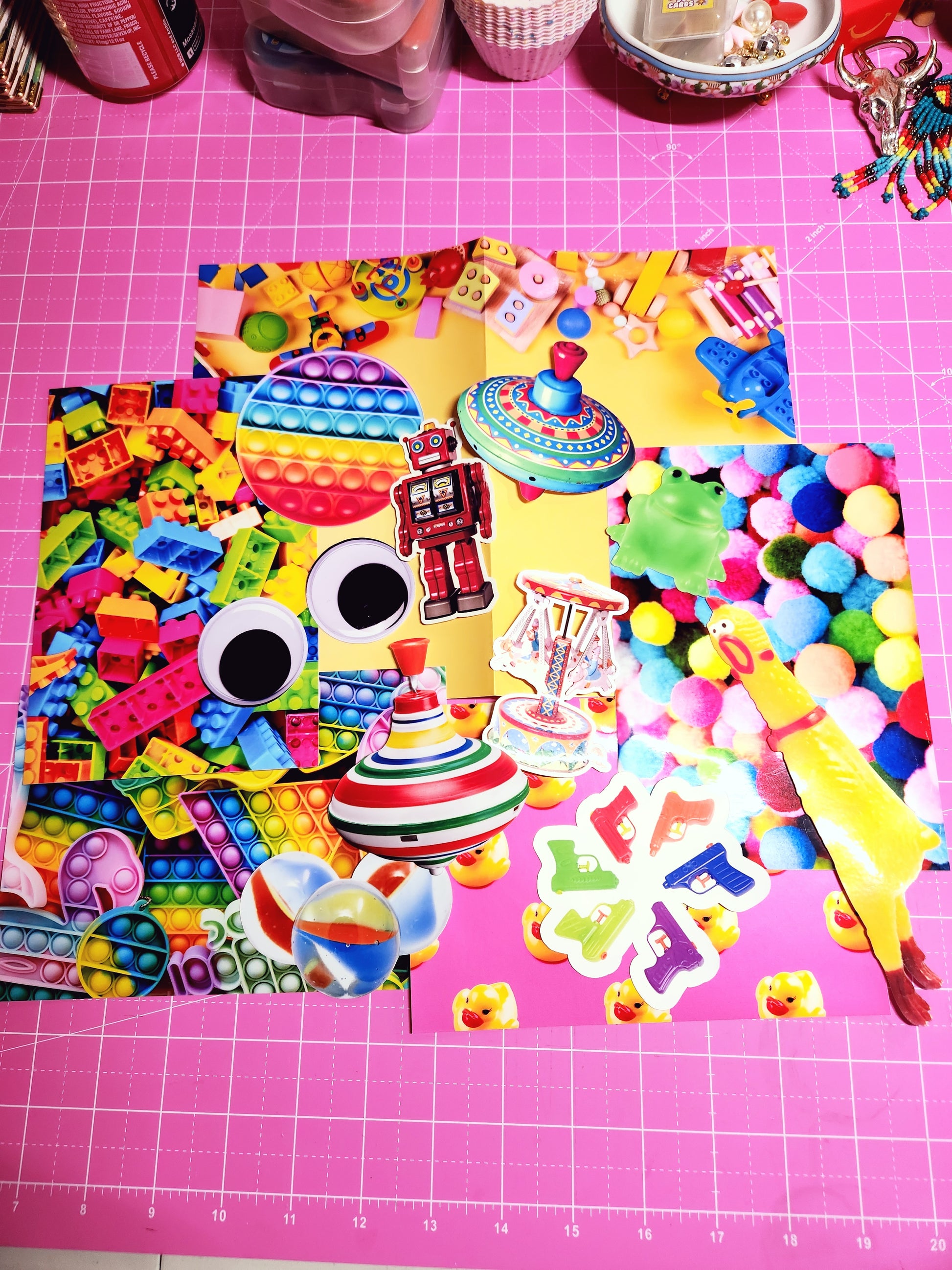 Colorful assortment of fidget toys on a pink cutting mat
