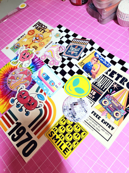 Collection of colorful stickers on a pink grid background