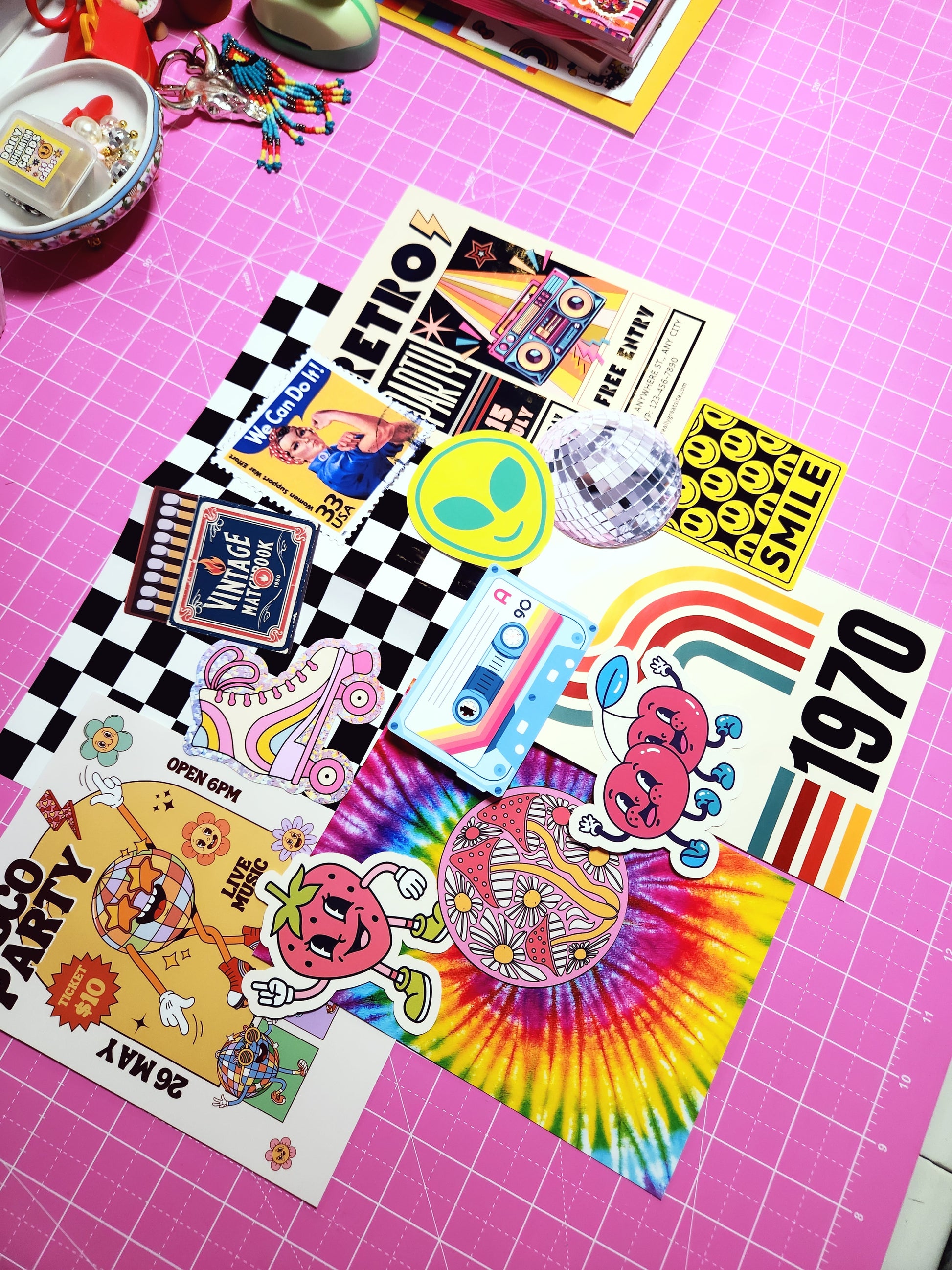 Collection of colorful stickers on a pink grid background