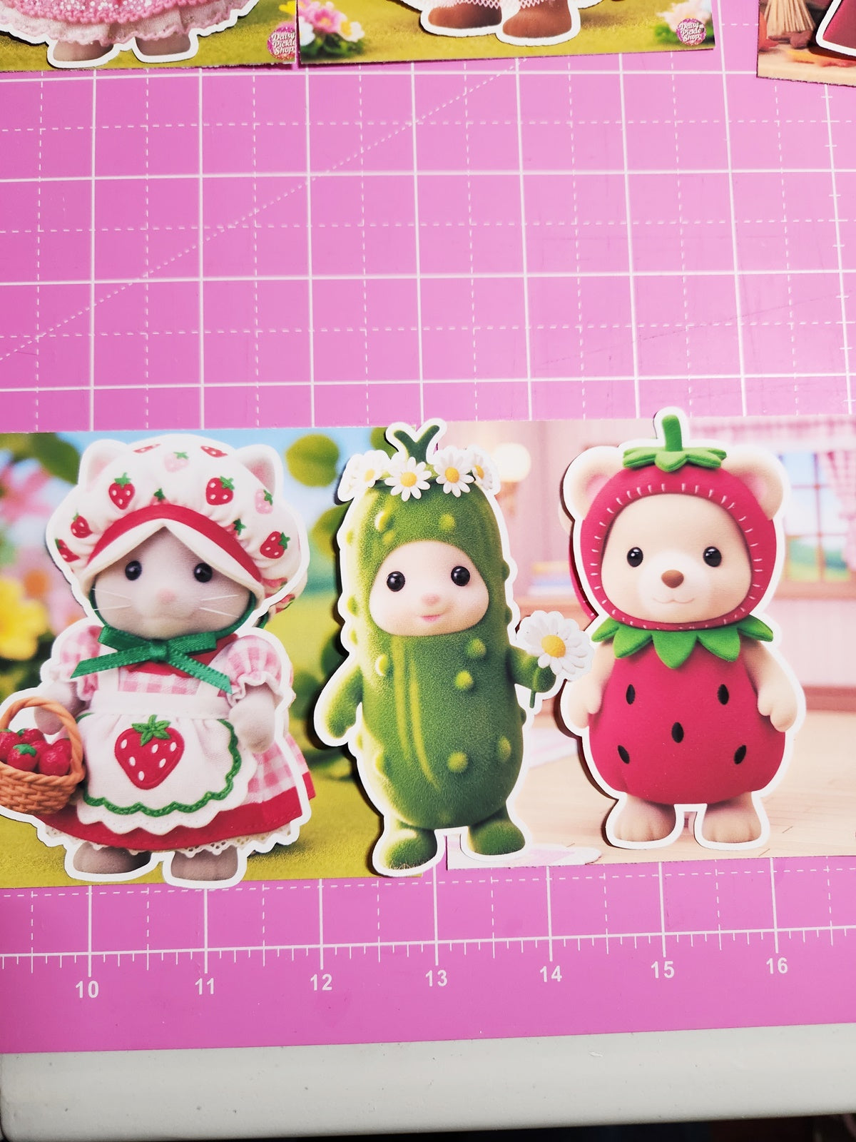 Three cartoon characters in costumes on a pink grid background