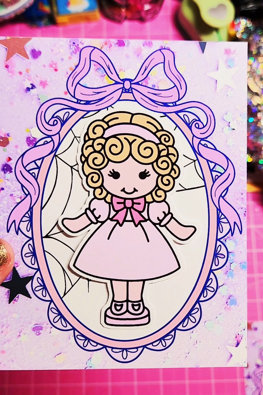 Cartoon girl with a bow in a decorative frame on a colorful background