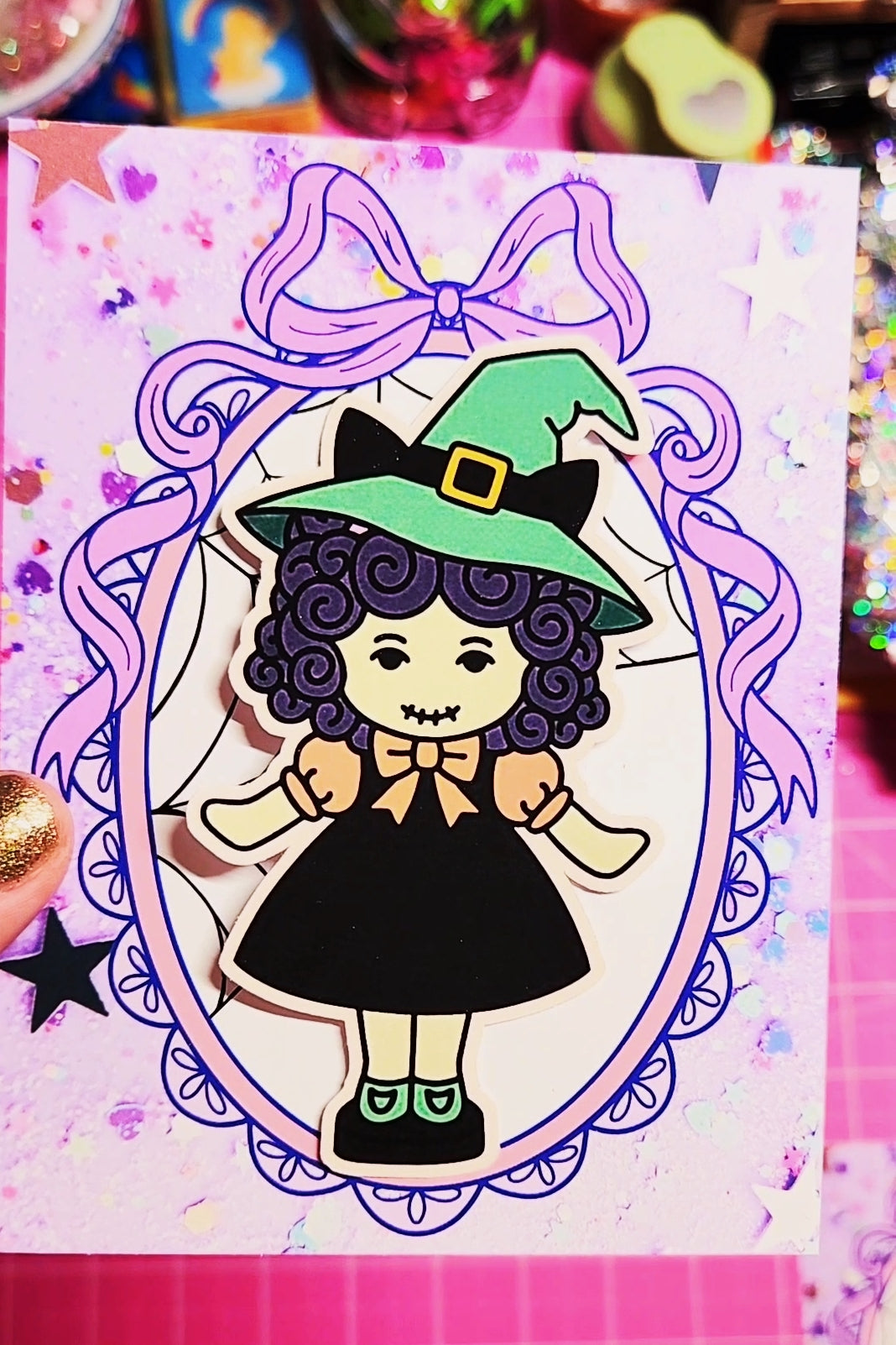 Cartoon witch character with a decorative frame on a colorful background