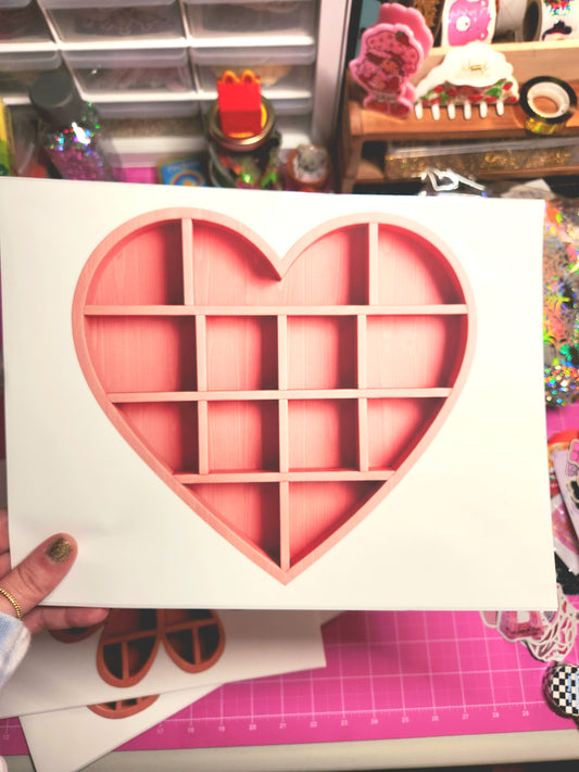 Heart-shaped pink organizer on a colorful background