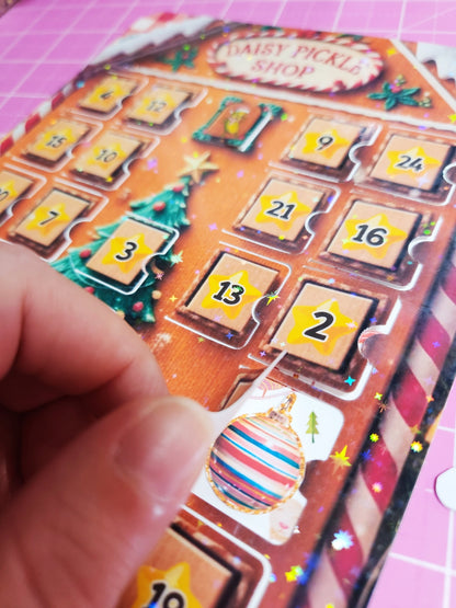 Close-up of a Christmas-themed advent calendar with numbered doors.