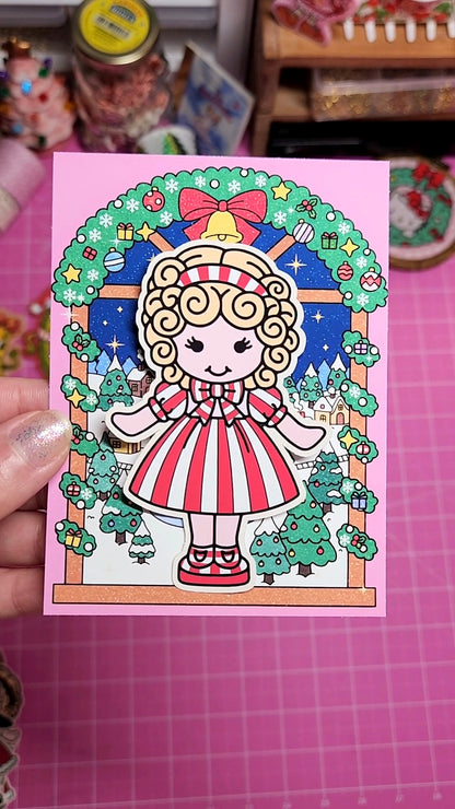 Colorful illustration of a cartoon character on a pink card with decorative border.