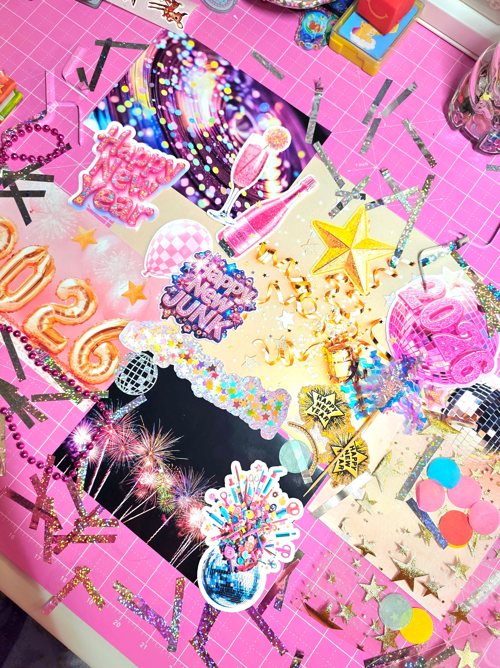 Collection of colorful decorative stickers on a pink grid background