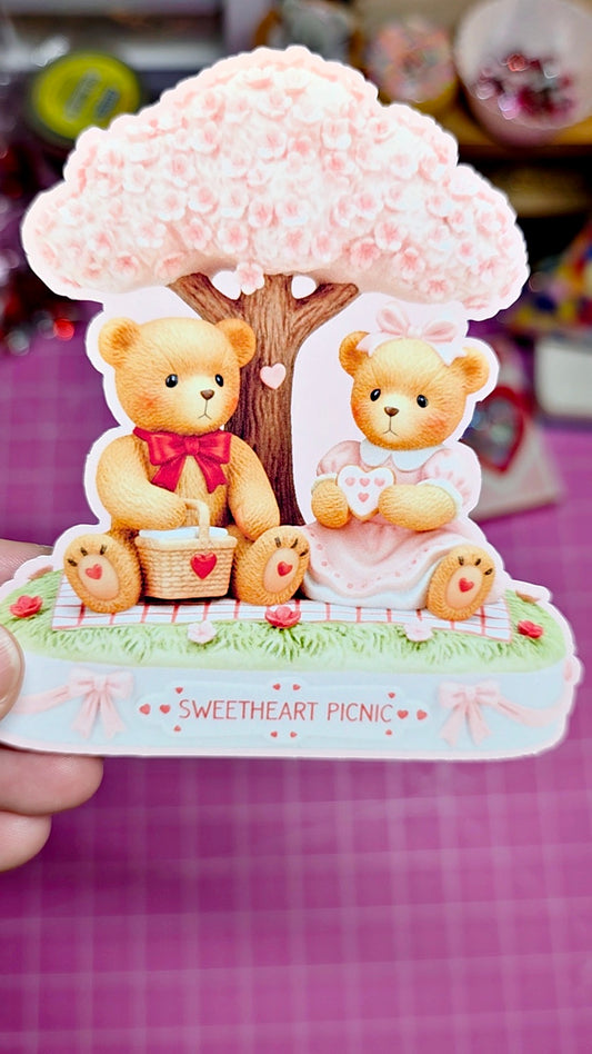 Card with teddy bears and a tree on a pink background