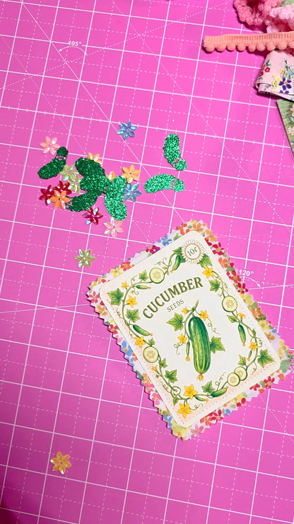 Decorative paper with 'Cucumber' design on a pink grid background