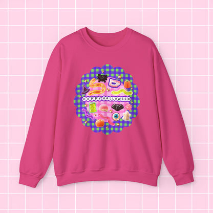 A pink crewneck sweatshirt featuring a colorful retro graphic with the text 'I DON'T LIKE APPETITES' on a pink and green gingham background, displayed on a light pink grid backdrop.