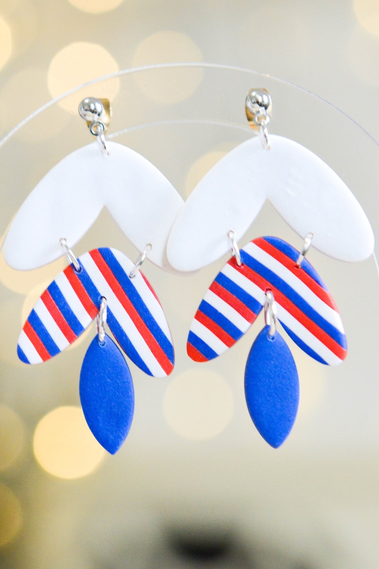 Festive Feather Earrings  Media 1 of 3