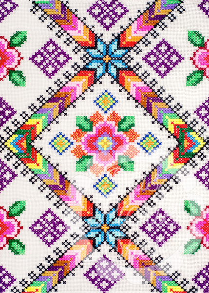 Colorful geometric pattern with flowers on a white background