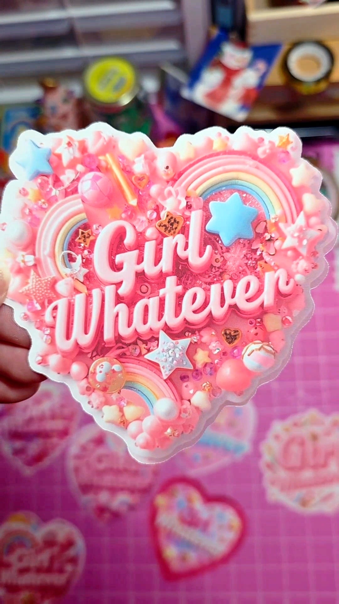 Decorative sticker with 'Girl Whatever' text on a colorful background